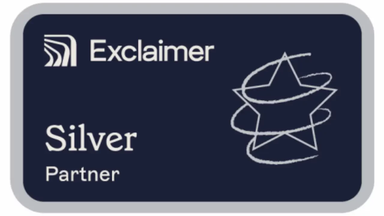screenshot of Exclaimer Silver Partner badge from https://exclaimer.com/partners/: a white graphic with silver borders and silver star design reading ‘Exclaimer Silver Partner’ on a blue background.